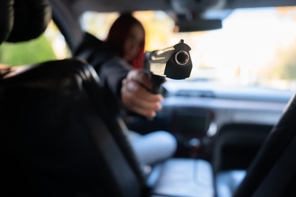 Criminal Assault in a Car – Female Driver with a Gun