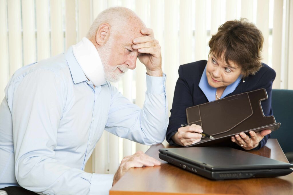 Lawyer helping personal injury victim calculate pain and suffering damages