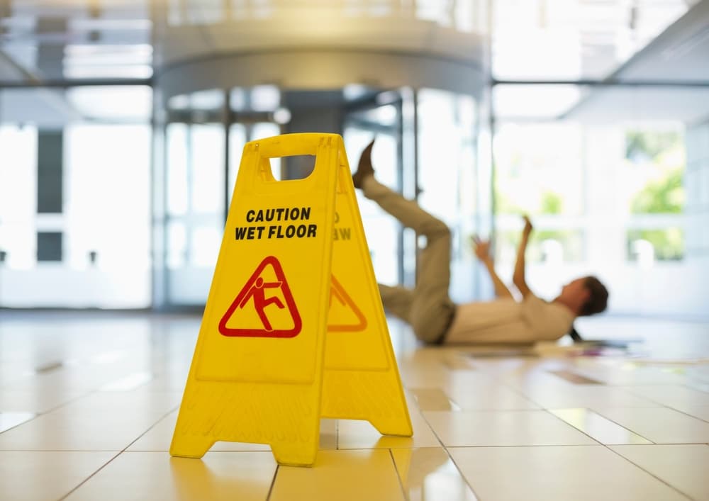 A man slip and fall on a wet floor of office premises