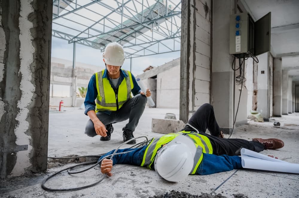 Accident at construction site, an engineer or electrician is electrocuted to the ground.