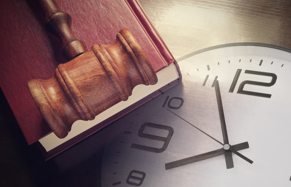 Clock, Gavel and a Book - Concept of legal timeline.